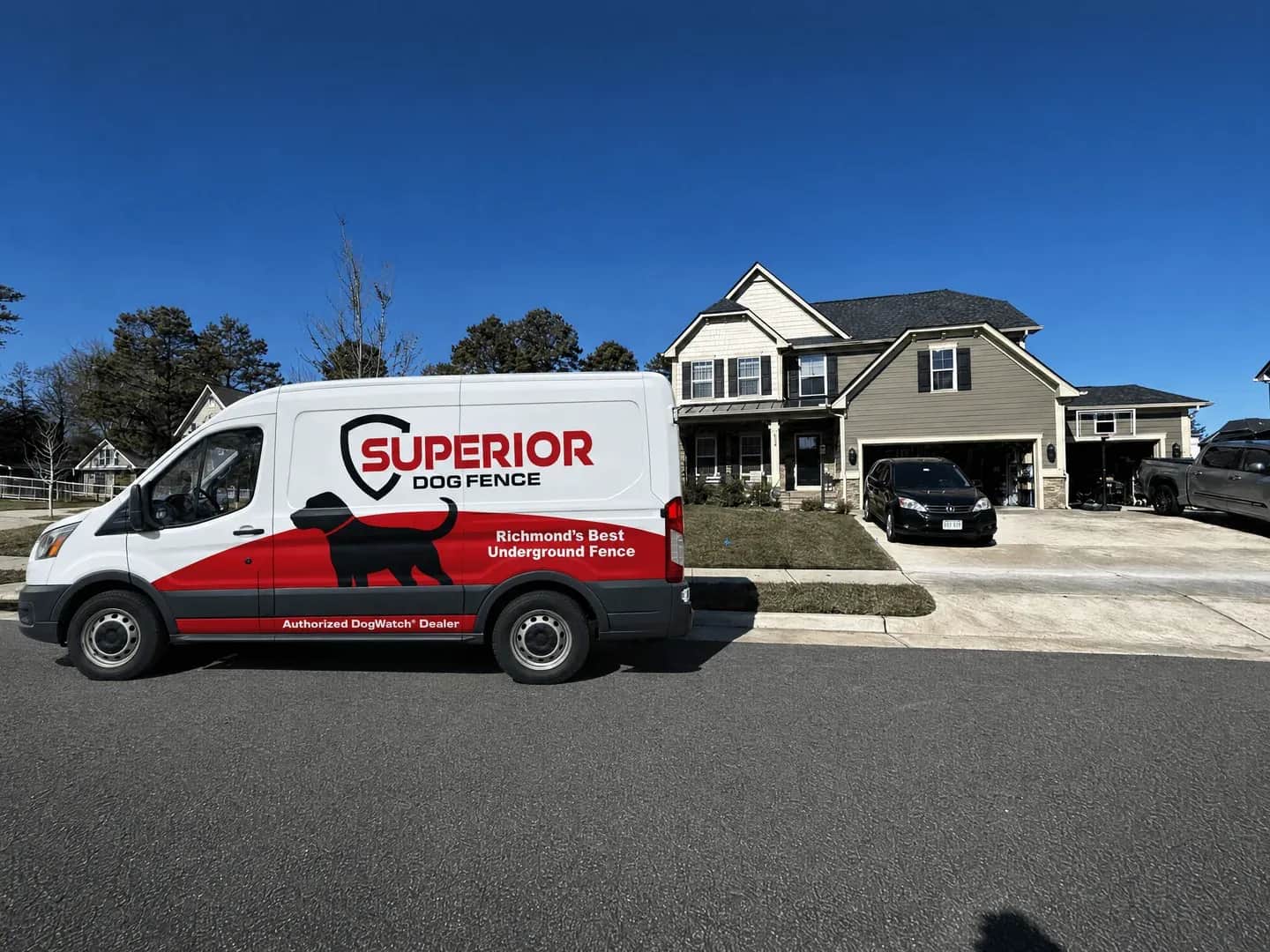 The Superior van parked in front of a home.